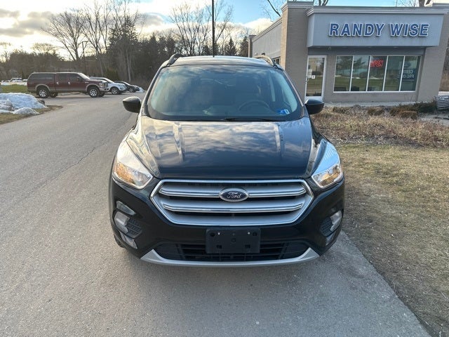 Used 2018 Ford Escape SE with VIN 1FMCU9GD8JUB78484 for sale in Ortonville, MI