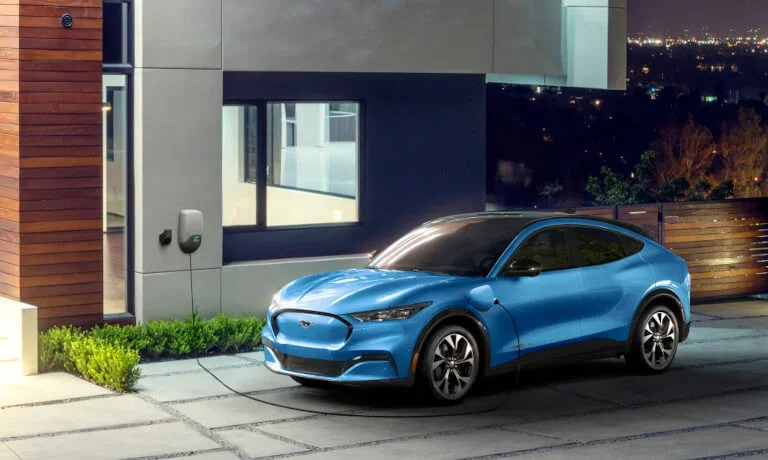 2023 Ford Mustang Mach-E charging at a house